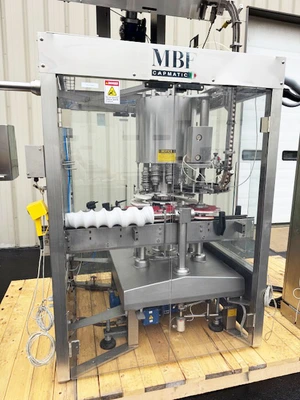MBF CAPMATIC 9-Head Rotary T-Corker with Hopper Elevator
