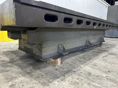 6' X 14'6" HEAVY DUTY T-SLOTTED LAYOUT TABLE ON RAISED BASE: STOCK #21788