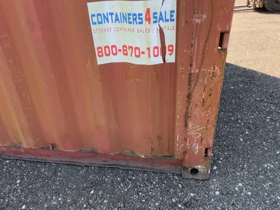 20’ Shipping / Storage Container 8’ wide x 8’ 6” tall, swing doors on one end, wood deck, rings for ...
