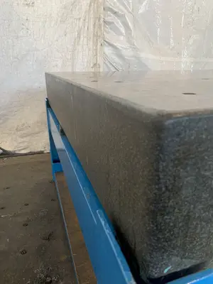 60" X 60" X 8-1/4" GRANITE SURFACE TABLE. STOCK # 1165023.