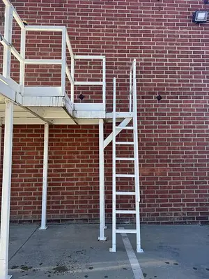 USED HEAVY DUTY CORNER MEZZANINE / MACHINE PLATFORM  154" X  117" X  136"