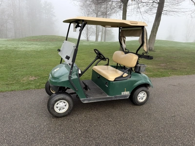 (1) 2015 E-Z-Go golf cart with a Kawasaki gas engine, includes canopy, fold-down windshield, and bal...