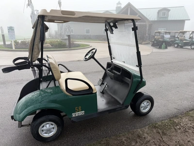 (1) 2017 E-Z-Go golf cart with a Kawasaki gas engine, model 625111G01, includes canopy, ball cover, ...