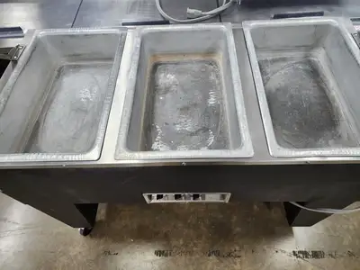 Used SuperMetal Used SuperMetal 3 Pan Open Well Heated Buffet Hot Food Steam Table with Open Base 208V Steam Tables (Food) Illinois US | Falcon Restaurant Supply #1376669