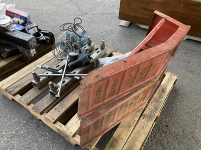 Skid lot of 4 piece swivel casters with bumpers, pulley with cord and remote, a snow scraper, a trac...