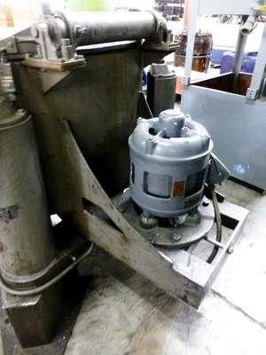 Tolhurst 40" Center-Slung chip wringer.