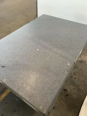 48" X 72" X 10" MICRO-FLAT GRANITE SURFACE PLATE W/ STARRETT BASE. STOCK # 1170823.