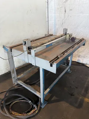 48” X 4" ARBOR STRILICH SLITTING LINE WITH FAMCO CUT OFF SHEAR & AMS CONTROLS. STOCK # 0664425