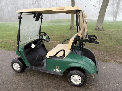 (1) 2017 E-Z-Go golf cart with a Kawasaki gas engine, model 625111G01, includes canopy, ball cover, ...