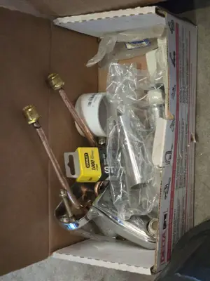 Plumbing and Home Improvement Items including Delta Faucet, Curtain Rods, and Shower Curtain - Conditions Untested