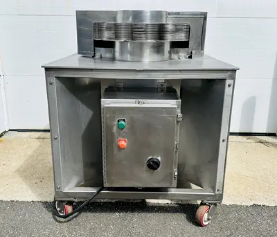USED URSCHEL 10 STATION SEMI-AUTOMATIC ROTATING ONION SLICER