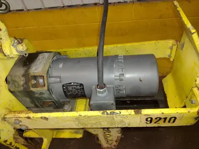 2000 LBS BRADLEY LIFTING POWERED TELESCOPING COIL GRAB LIFTER: STOCK #17883