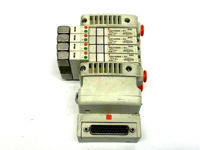 VV5QC11-04N3FD2 | SMC  D-Sub Manifold 4 Station w/ VQ1400N-51 Pneumatic Valves - Used