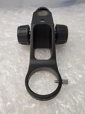 MICROSCOPE FOCUSING MOUNT