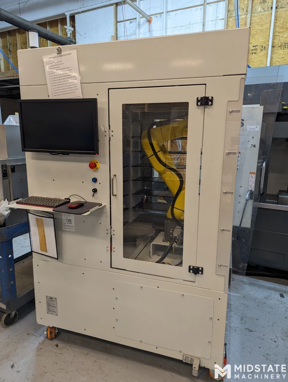 automated CNC loading and unloading robot cell