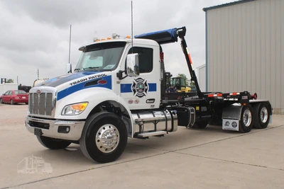 Used 2027 PETERBILT 548 Hooklifts & Roll-Offs Texas US | Roll Off Truck World #1491992