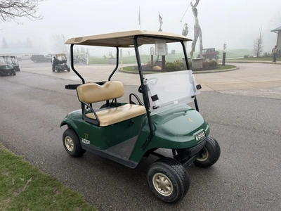 (1) 2014 E-Z-Go golf cart with a Kawasaki gas engine, includes canopy, ball carrier, fold-down winds...