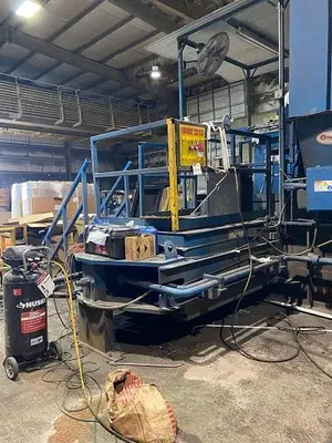 125 HP Two Ram Badger and Conveyor Combo