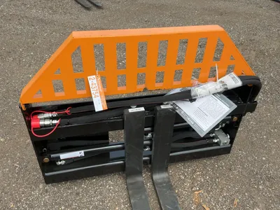 Used WOLVERINE PFA-11-3300G SKID STEER PALLET FORK HYDRAULIC ADJUSTABLE Pallet Forks Michigan US | Miedema Asset Management Group #1468768