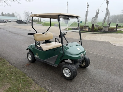 (1) 2015 E-Z-Go golf cart with a Kawasaki gas engine, includes Club Clear club and ball washer, does...