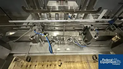 USED Capmatic Capmatic Bottle Filling Line