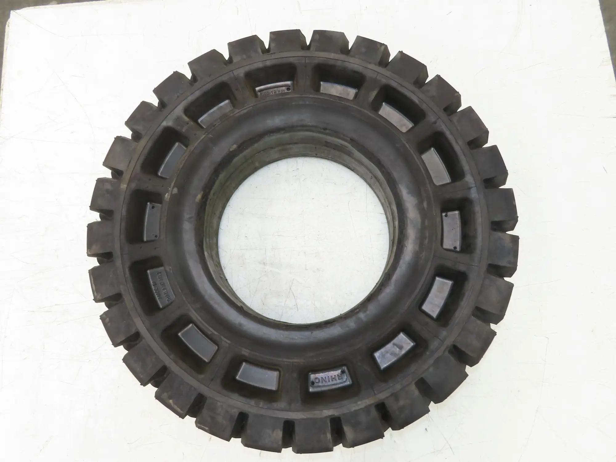 Rhino 7.00-12/5.00 Forklift Tire Resilient Solid Traction Black 25x7x12