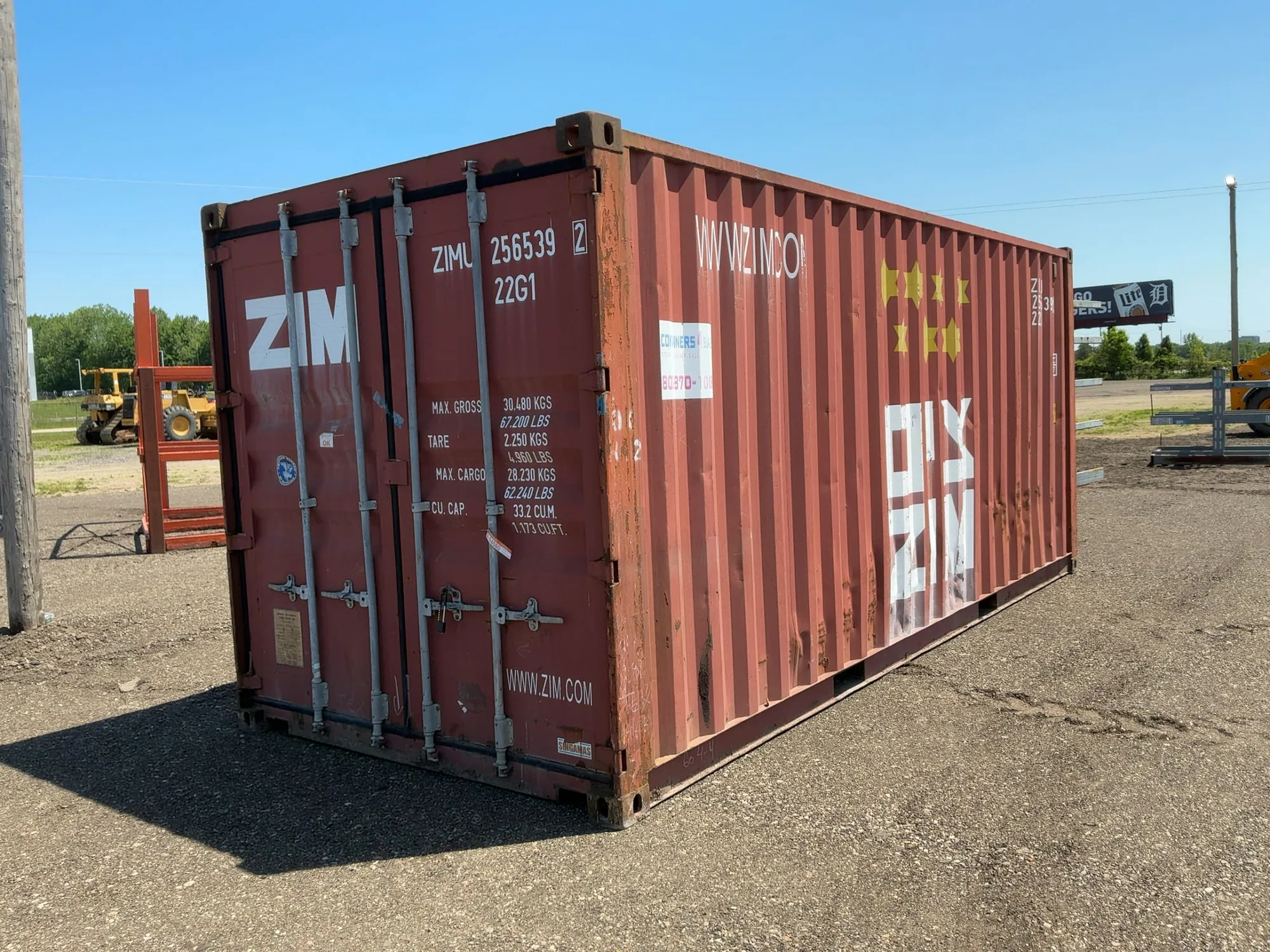 20’ Shipping / Storage Container 8’ wide x 8’ 6” tall, swing doors on one end, wood deck, rings for ...