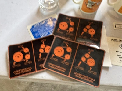 (1) Assorted Allis-Chalmers items including cups, stickers