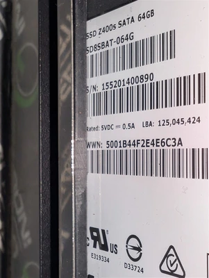 Sandisk SD8SBAT-064G SATA Hard Drive with Delock Mobile Rack Mount 64GB Used
