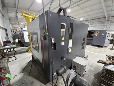 2018 Leadwell V-50i VMC w/ 30-Slot ATC, Conveyor, Kurt Vise, Fanuc Oi-MF Controller