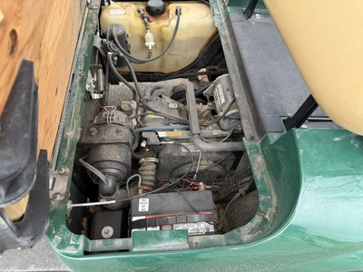 (1) 2015 E-Z-Go golf cart with a Kawasaki gas engine, does not include Club canopy, includes ball wa...