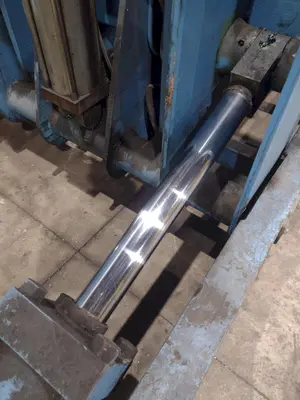 20,000 LBS X 54" X 36" BRANER HYDRAULIC COIL CAR UPENDER WITH POWER FEED CONVEYOR: YOBRO #25238