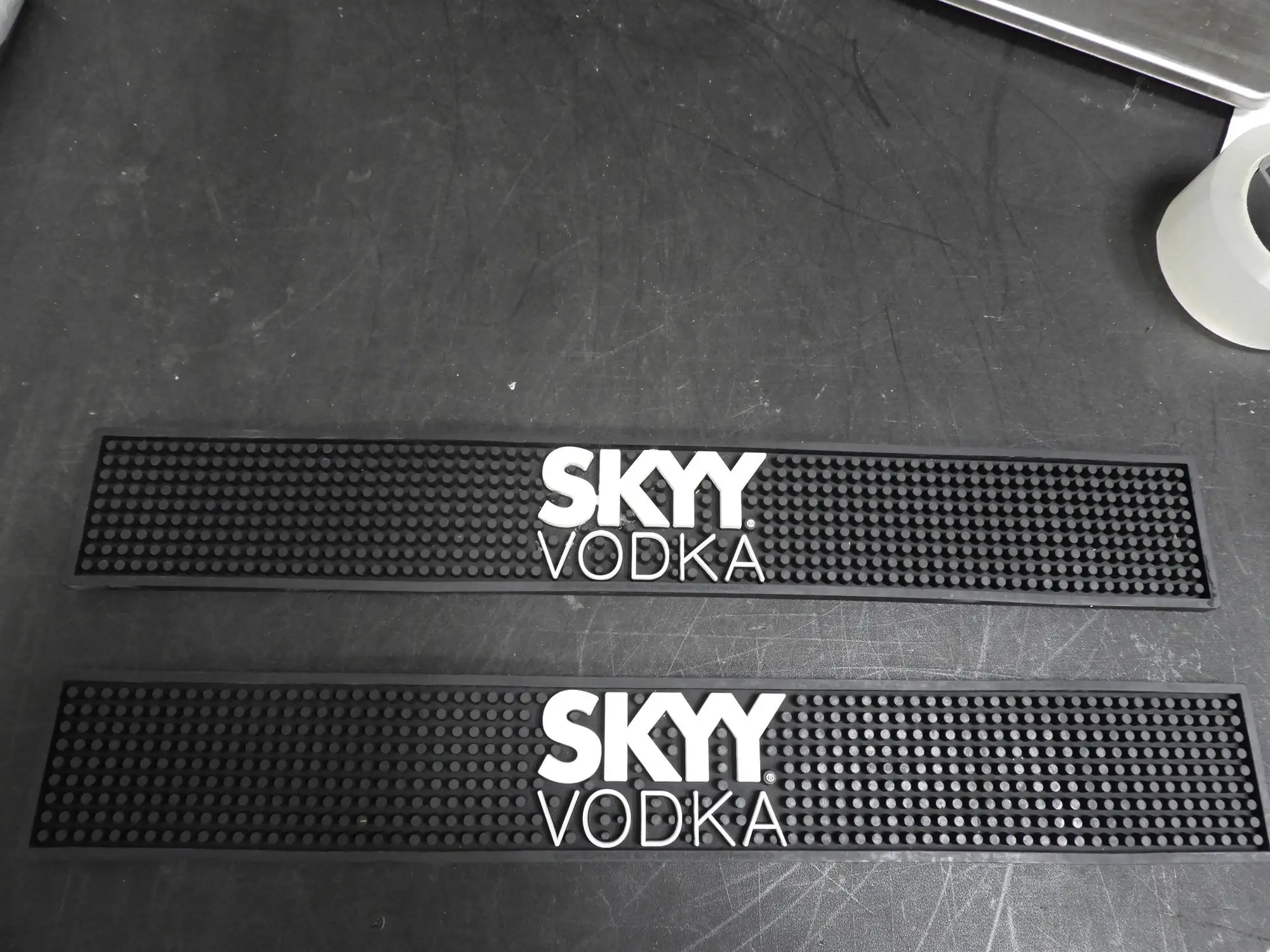 Used Falcon Restaurant Supply Used One Skyy Vodka Bar Mat Spill Mat Rail Beer Tap Mat 22.5"x3.25"x7/16" Food, Restaurant, & Bakery Parts & Accessories Illinois US | Falcon Restaurant Supply #1378030