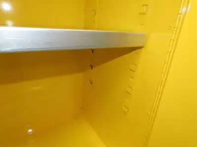 Uline H-1563M-Y Yellow Flammable Safety Cabinet Dual Door 30 Gallon Liquid
