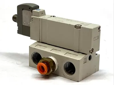 USED SMC SOLENOID VALVE 5-PORT 24VDC 1/4" BASE MOUNT