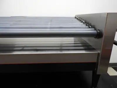 Used Nemco Used Nemco 8250-SLT 50 Commercial Hot Dog Roller Grill - Slanted Top, 120v Grills & Griddles Illinois US | Falcon Restaurant Supply #1376520