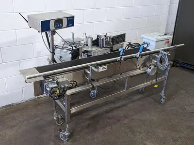 USED 2015 DOMINO PRINTING SCIENCES M-SERIES PLUS-WR100-LEFT-90-11