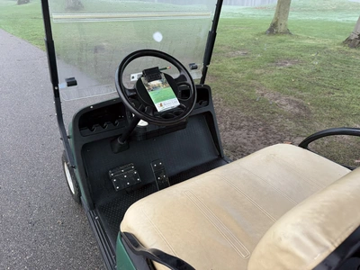 (1) 2015 E-Z-Go golf cart with a Kawasaki gas engine, includes canopy, ball cover, club cover, fold-...