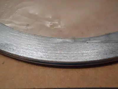 USED FLEXITALLIC HANDHOLE GASKET SEAL 6-1/16" ID X 7-3/16" OD X .1750" THICK