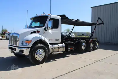 New | in-Stock 2027 PETERBILT 548 Rolloff Trucks Texas US | Roll Off Truck World #1492012