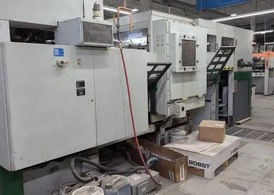 USED 1993 BOBST SP 103-ER DIE CUTTER WITH BLANKING