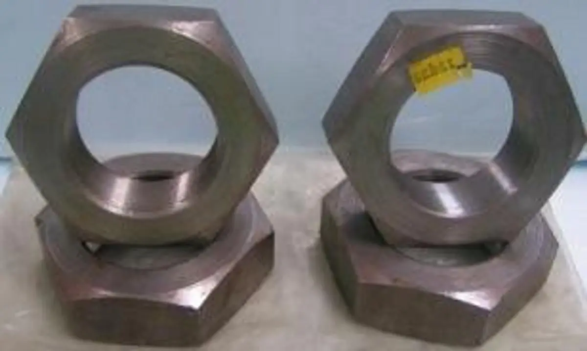 QTY. 4. 2 1/8 INCH LOCK NUT 15629....