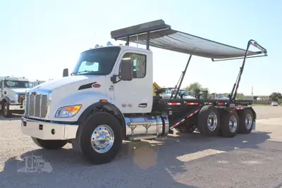 New | in-Stock 2027 PETERBILT 548 Rolloff Trucks Texas US | Roll Off Truck World #1492020