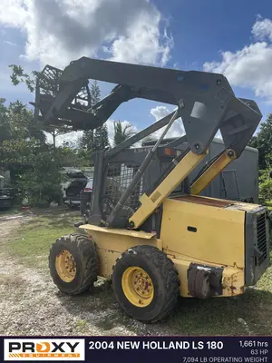 Used 2004 NEW HOLLAND LS 180 Skid Steer Loaders Florida US | Proxy Equipment #1377902