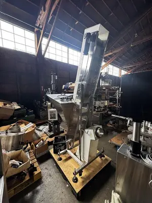USED INLINE FILLING SYSTEMS CAP HOPPER/ELEVATOR