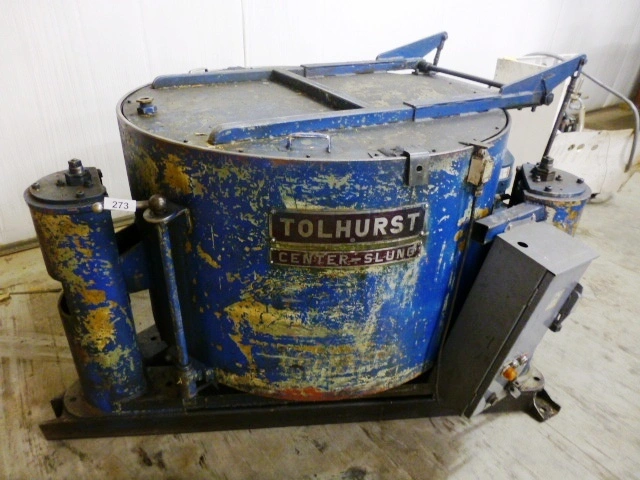 Tolhurst 40" Center-Slung chip wringer.