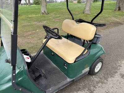 (1) 2015 E-Z-Go golf cart with a Kawasaki gas engine, does not include Club canopy, includes ball wa...