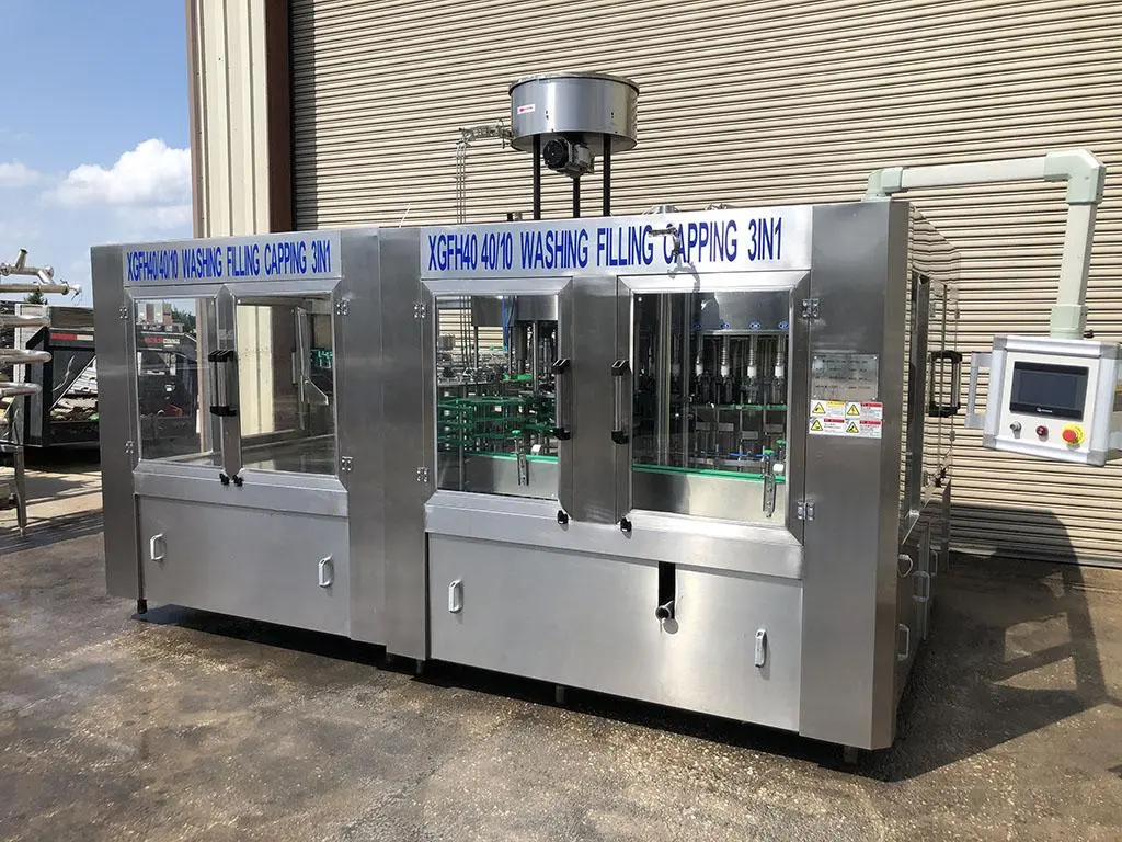 USED 2017 ZHANG J IAGANG, BEIJING CHINA TRI-BLOCK 40 VALVE BOTTLE RINSER, FILLER, CAPPER