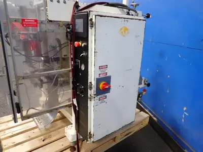 USED 2002 UNIVERSAL PACKAGING INC S1500CA