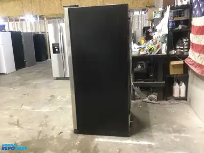 USED GE STAINLESS STEEL AND BLACK SIDE X SIDE REFRIGERATOR HEAVY DUTY ENERGY STAR